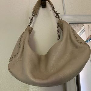 Juicy Couture Leather Shoulder Bag. Beige with Silver Accents.